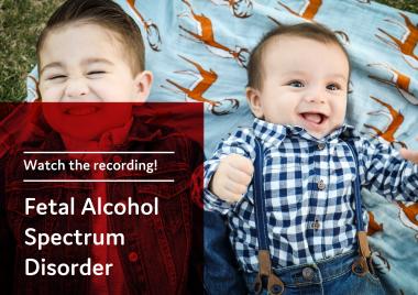 baby and toddler lying on their backs looking up at the camera
