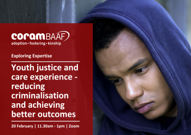 teenage boy looking sad with his hood up