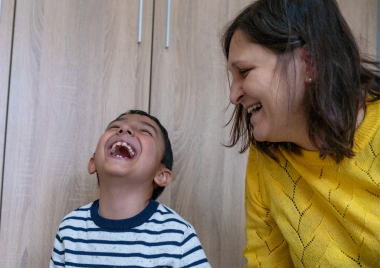 woman and child laughing