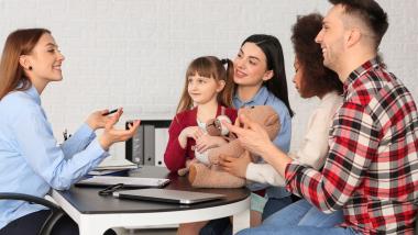 Family discussing adoption