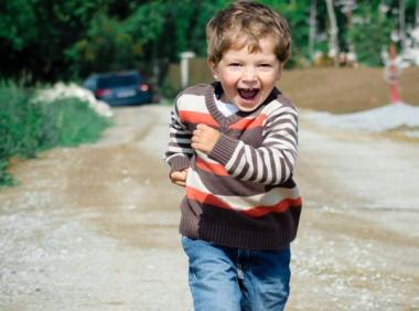 Young boy running