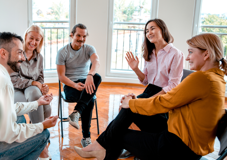 group of people in conversation