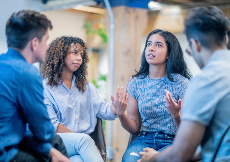 group of people in conversation