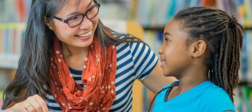 Social worker talking to child